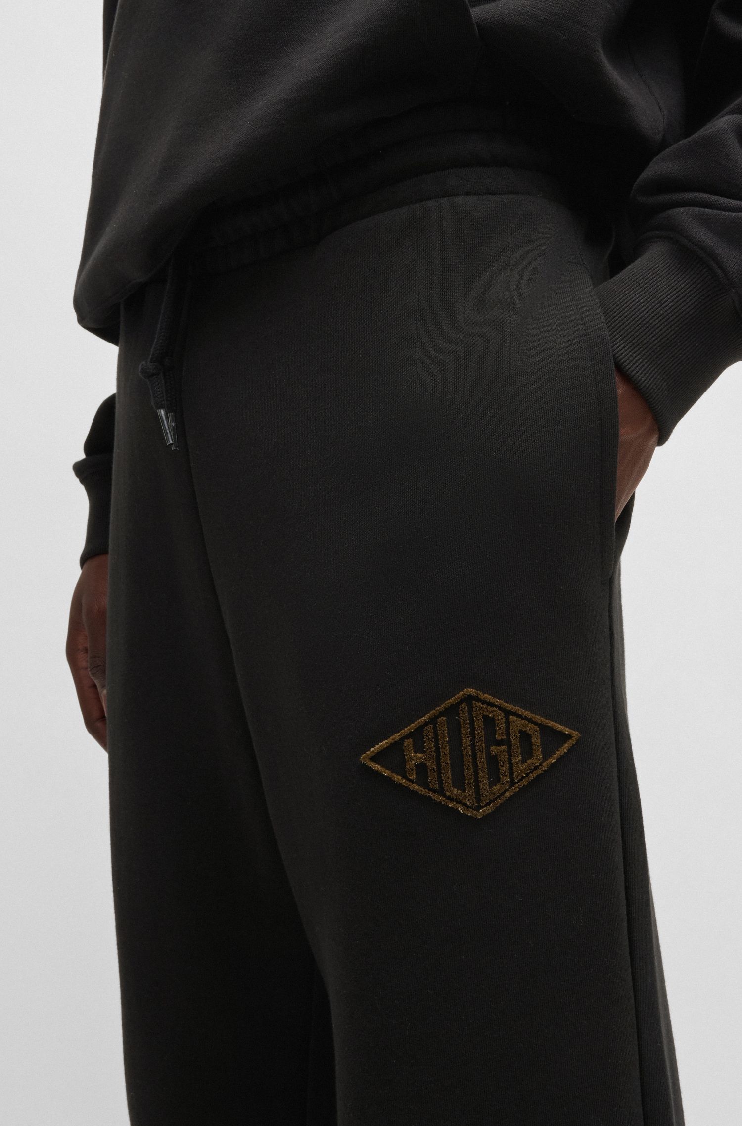 【HUGO雨果】刺绣徽标图案棉质毛圈布运动裤