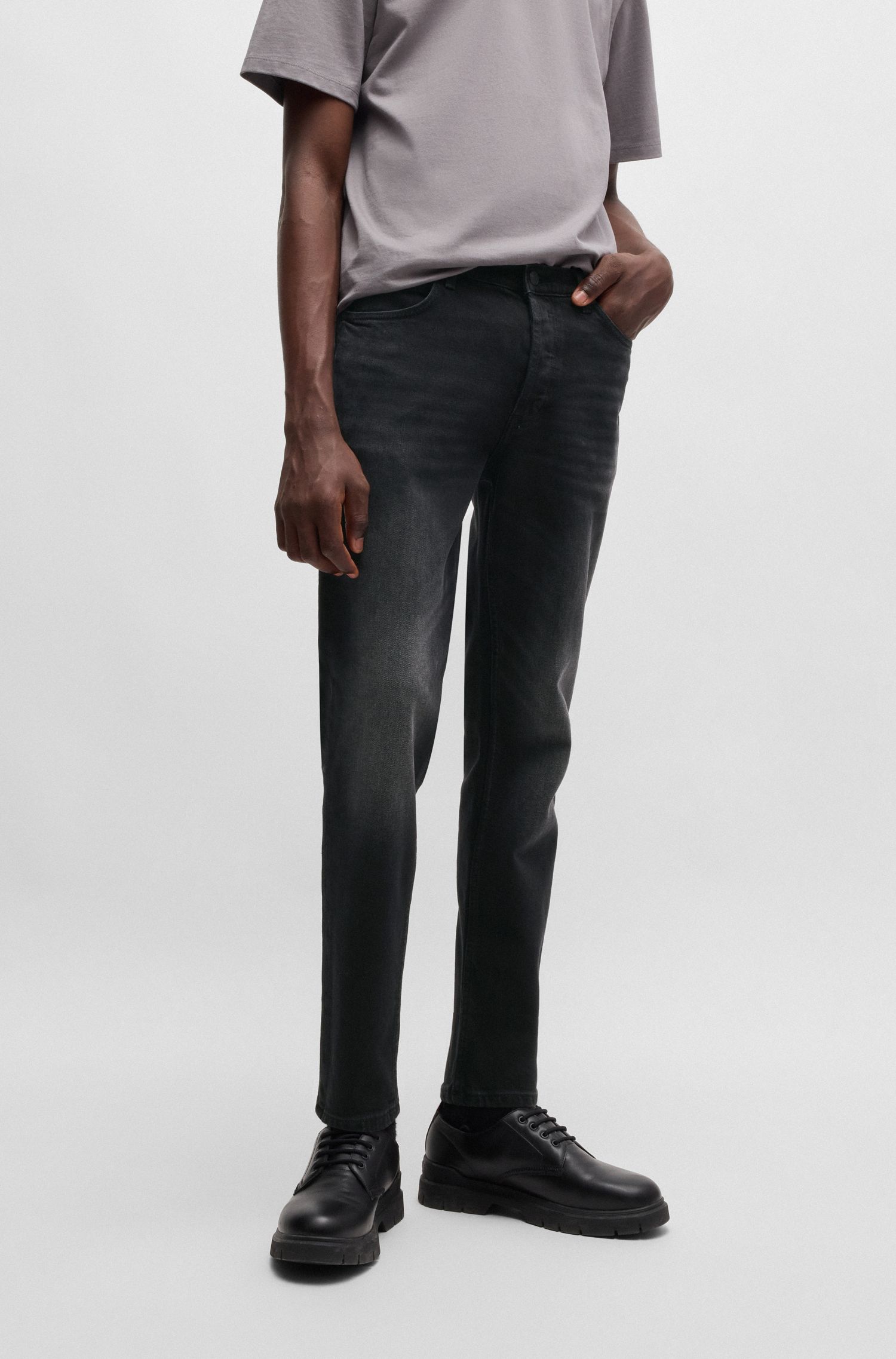 【HUGO雨果】纯黑色锥型弹力牛仔裤